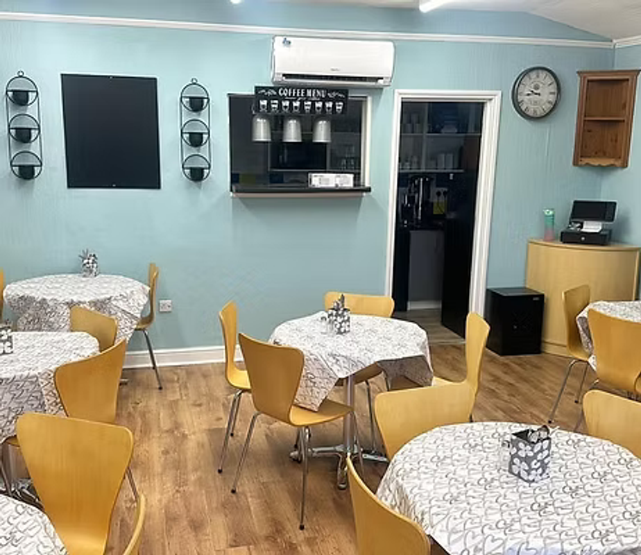 Tables and counter inside East Kirkby Café